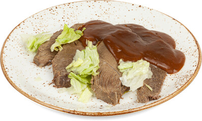 Beef with barbecue sauce on a plate on a white background