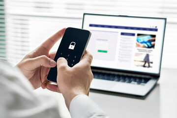 Protect data online. Personal privacy. Cyber fraud safety in phone with password on internet. Bank information and digital identity scam or theft. Lock and 2fa security. Laptop computer and website.