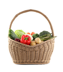 Different ripe vegetables in basket isolated on white