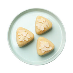 Pieces of delicious semolina halva with almond flakes isolated on white, top view