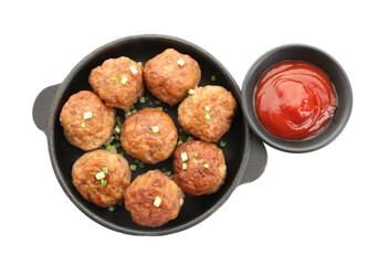 Tasty meatballs with green onion in baking dish and tomato sauce isolated on white, top view