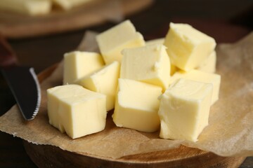 Pieces of fresh butter on table, closeup