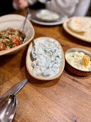 Haydari is a type of yogurt made from certain herbs and spices, combined with garlic. Turkish cuisine.