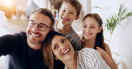 Selfie, father and mother with children in home, family memory and profile picture for social media. Parents, girl and boy with smile for photography, connection or relationship with bonding in house