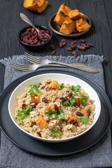quinoa pumpkin salad in a bowl, top view