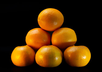 Close up of fresh oranges stacked
