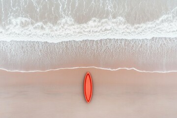 A vibrant orange surfboard lies on a sandy beach, capturing the tranquility of summer days by the ocean Perfect for promotions related to water sports and beach activities