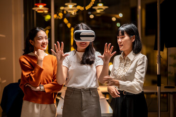 Three women are playing a video game together