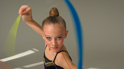 Little girl child kid daughter Caucasian schoolgirl young athlete teenager sport gymnast artistic...