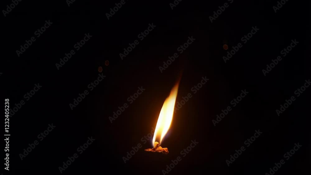Poster glowing fuse sparks dancing and creating small flame, emitting incandescent particles against deep b