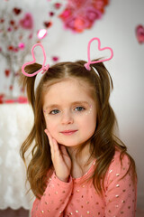 little girl with a valentine's day heart