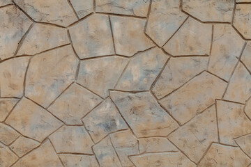 Concrete floor or wall with stone texture stamp