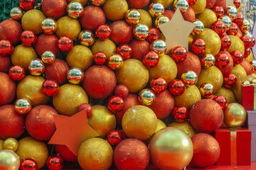 Close-up of red and gold Christmas balls.Holiday background.New Year decor, New Year decoration