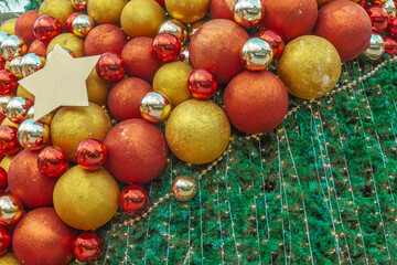 Close-up of red and gold Christmas balls.Holiday background.New Year decor, New Year decoration
