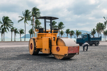 road roller at the construction of a new park on the seashore