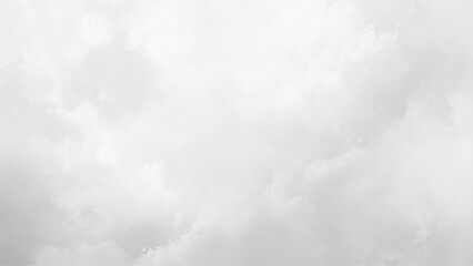 Gray sky with white clouds. Beautiful sky background and wallpaper. White cloudy sky for background. White cumulus clouds on the sky. 