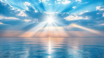 Obraz premium Serene seascape at sunset, featuring a radiant sun casting dramatic light rays across a calm ocean. Blue and orange hues dominate the sky, with soft