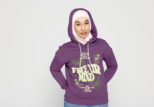 Woman in Hoodie and Hijab Poses Confidently in Casual Wear. Mockup customizable in color and design