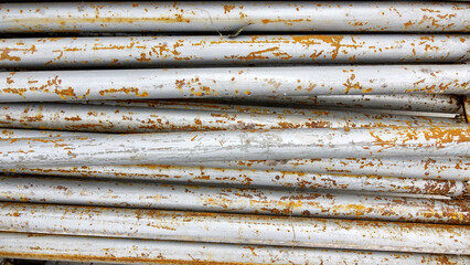 Pipes used for fastening wooden beams in concrete construction. Pipes of support formwork. Metal supports for scaffolding and formwork. Building