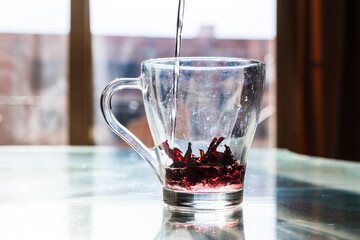 Red Hibiscus tea in the cup. Karkade tea for ramadan celebrations 