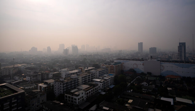 Bangkok Cityscape with PM 2.5 Air Pollution Haze, Urban Smog Over Skyline, Foggy Atmosphere in the Metropolis
