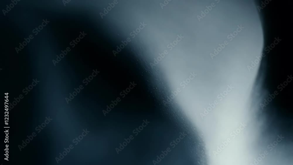 Poster white powder falling, creating soft dust cloud spreading dynamically against deep black background, 