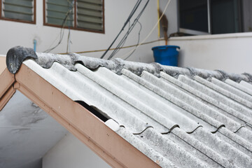 Obraz premium Close-up of a damaged tiled roof.