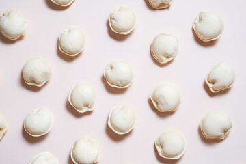 Pattern of raw dumplings. Frozen food.