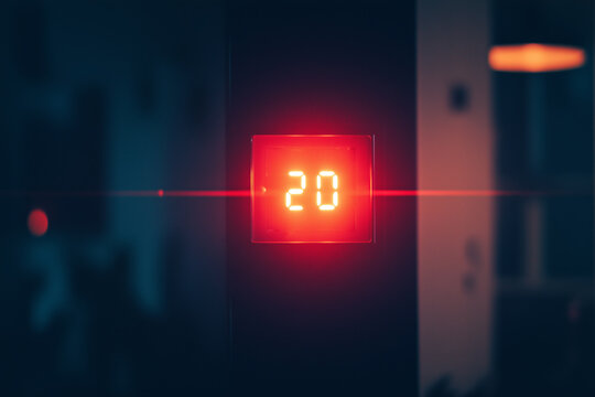 Bright digital countdown timer displaying twenty seconds in a dimly lit space