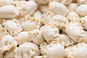 Authentic Chinese uncooked dumplings ready for steaming