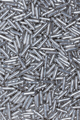 Shiny Silver Sugar Sprinkles Close-Up &ndash; Metallic Edible Candy Decorations for Baking, Cake Topping, Desserts, and Festive Pastries