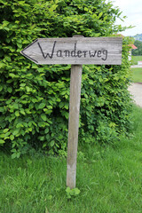 Sign of hikiing path.