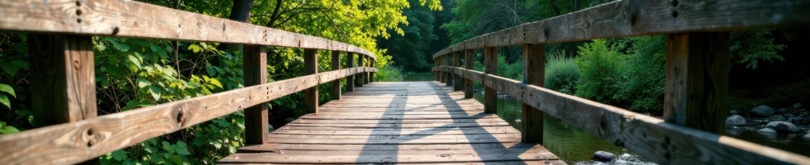 Obraz premium Rustic black and white striped wooden bridge over creek, rustic, rural