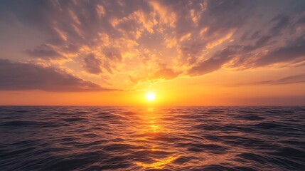 Fototapeta premium Sunset over the ocean creates a serene, picturesque landscape with vibrant colors and reflective water.