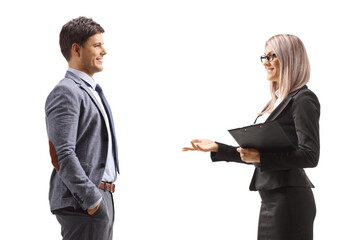Male and female colleagues having a conversation