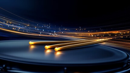 Golden drumsticks on dark drum, light trails, music promo