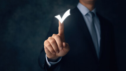 The businessman makes a decision or choice, ideal for rating, credit approval or endorsement