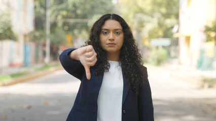 Indian Businesswoman Showing Thumbs Down