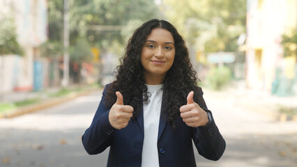 Indian Businesswoman Showing Thumbs Up with Both Hands