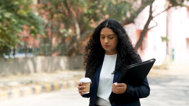 Sad Indian Businesswoman Walking