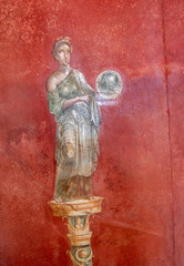 fresco of a woman from the Roman period on a red background, Pompeii 79 AD