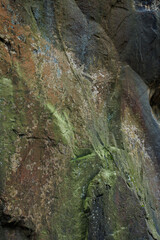 Large rocky rocks. Rocks of rocks. Gray moss-covered rocks