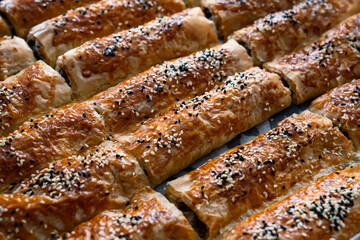 Traditional turkish minced meat and sesame pastry