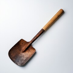 Rusty old small gardening shovel with wooden handle isolated on white background