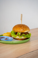 Delectable Burger with Thick Patty, Melted Cheese, and Fresh Greens Stealing the Show