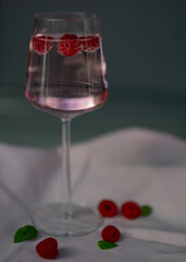 Glass of rasberry drink. 
