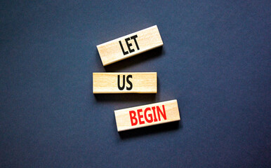 Let us begin symbol. Concept words Let us begin on beautiful wooden blocks. Beautiful black table...