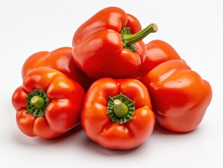 fresh red bell peppers isolated on a white background