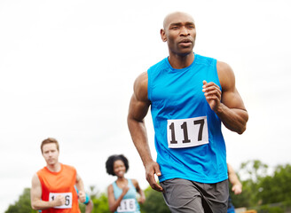 Fitness, cardio and people at outdoor track with race, marathon or relay for charity event. Sports,...