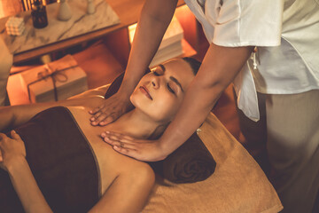 Caucasian woman customer enjoying relaxing anti-stress spa massage and pampering with beauty skin...